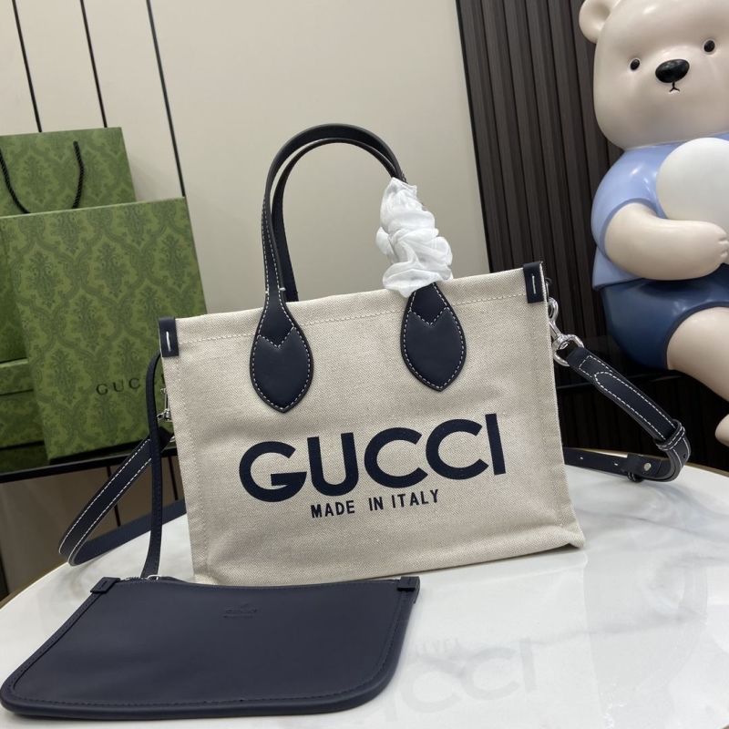 G*u*i shopping bags